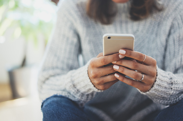 african american woman texting