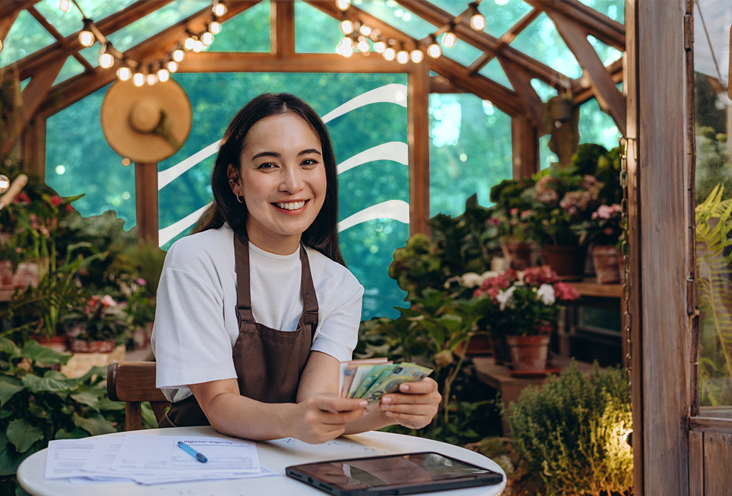 Woman working with cash in hand