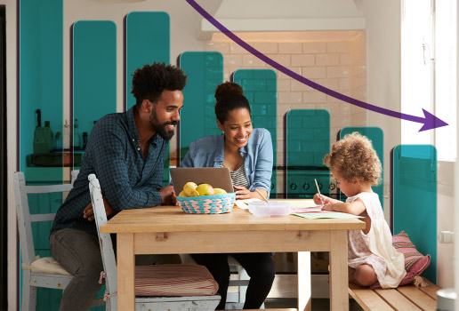 Family working on bills at table